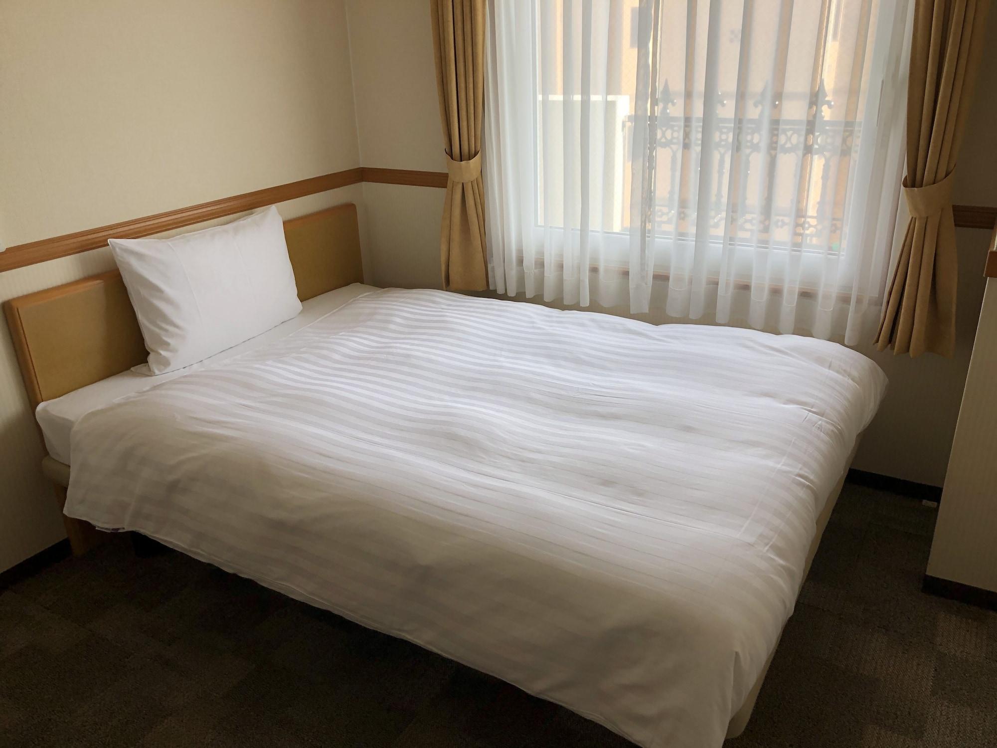 阪急十三站西口东横inn 大阪 外观 照片