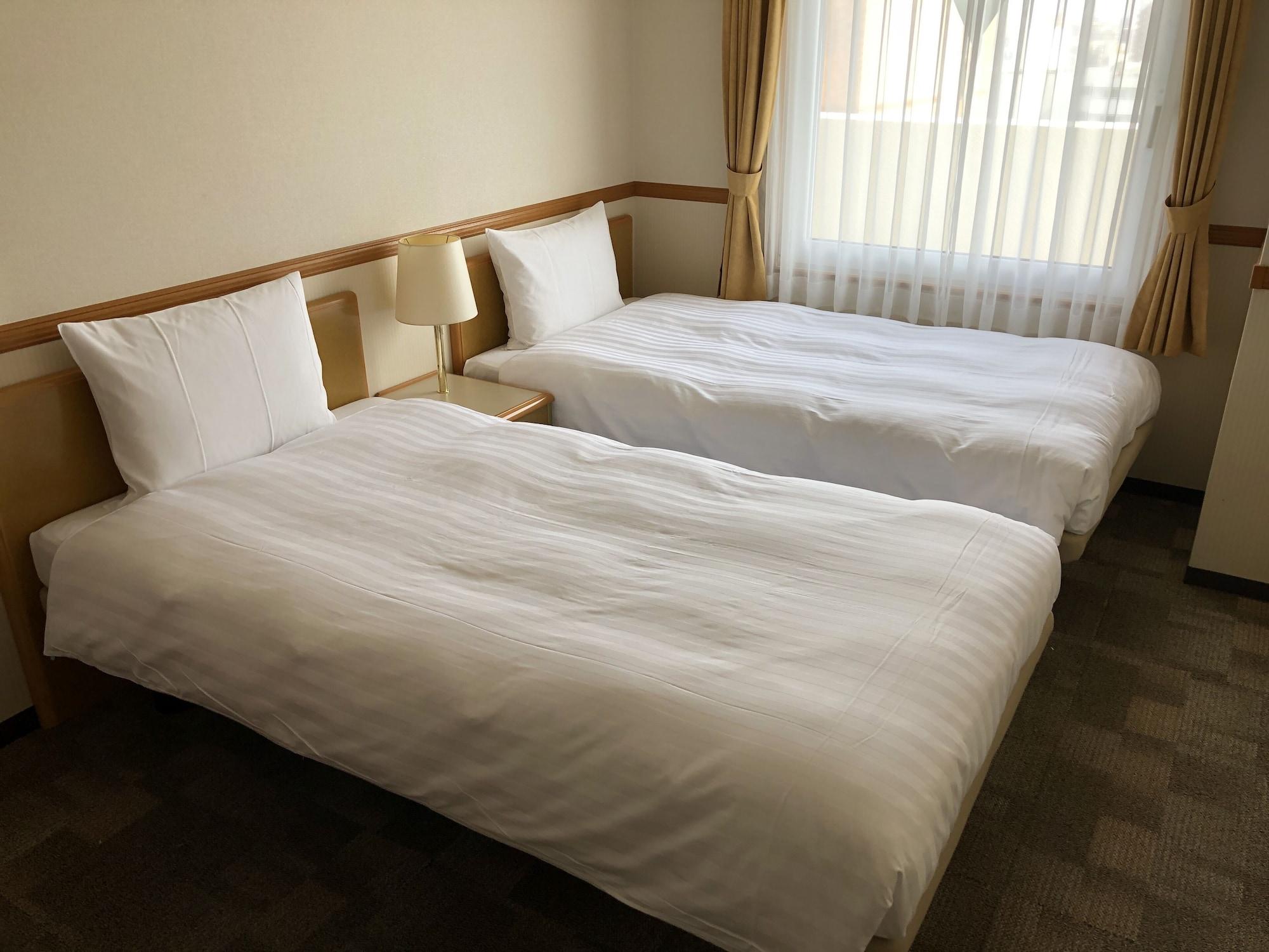 阪急十三站西口东横inn 大阪 外观 照片