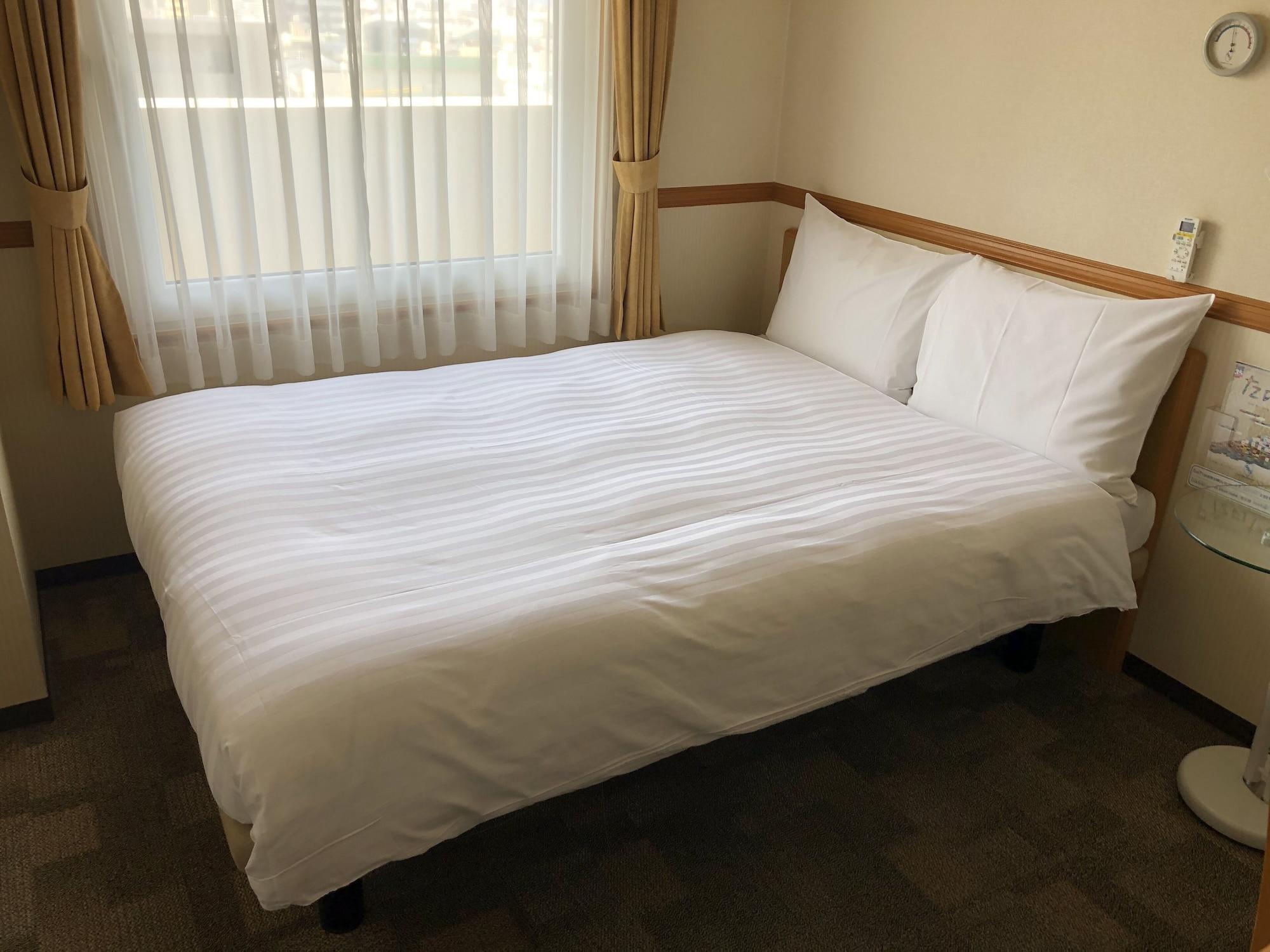 阪急十三站西口东横inn 大阪 外观 照片